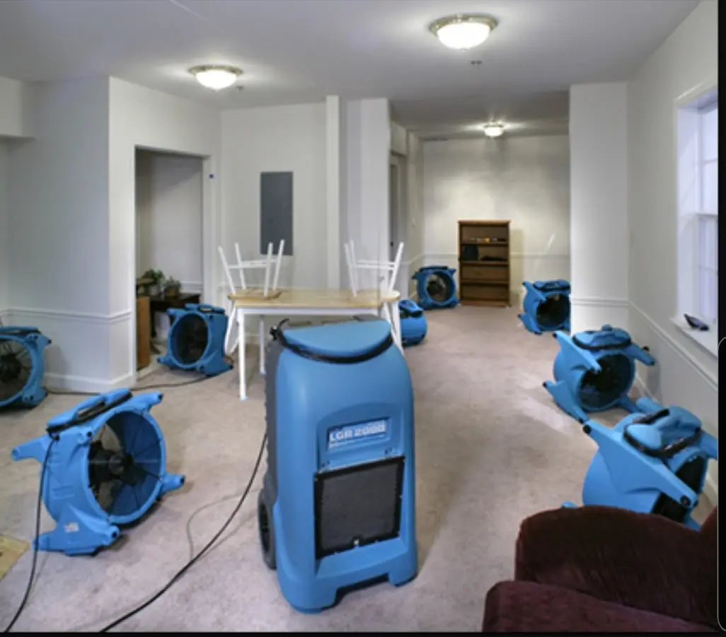 Air movers and dehumidifier setup for Water Damage Restoration in Bondurant