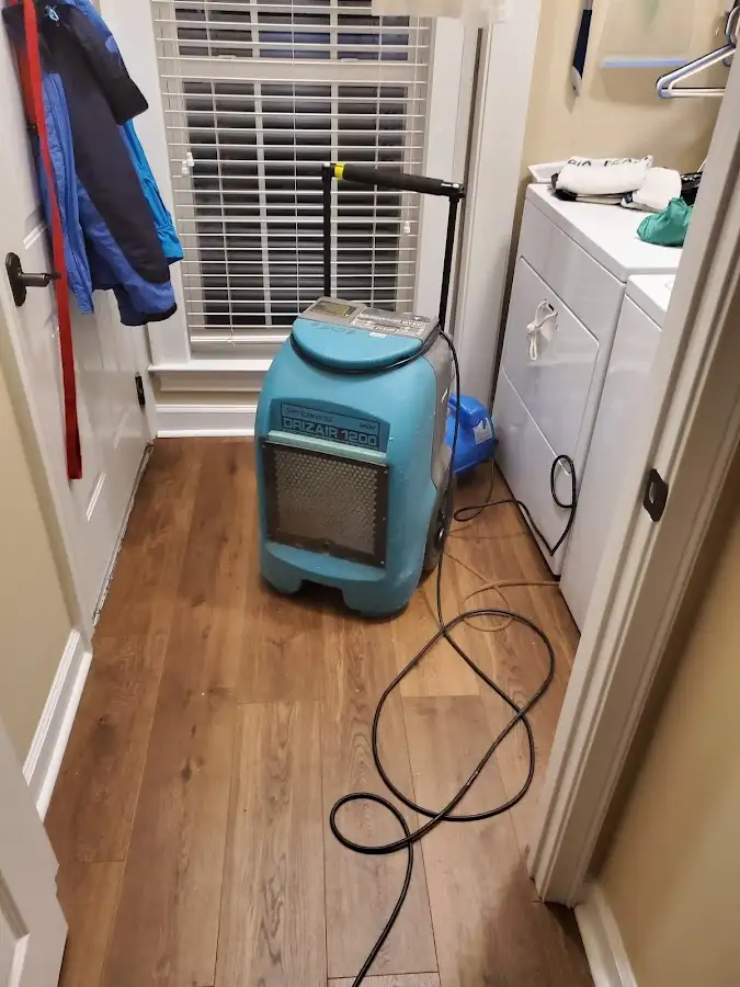 Commercial dehumidifier deployed for Flood Damage Cleanup in Bondurant